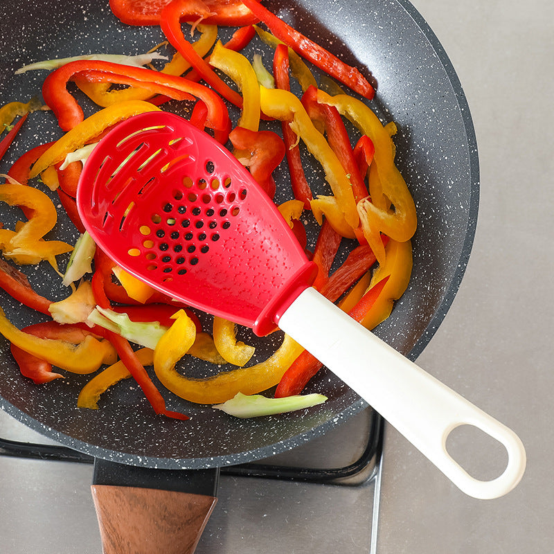 Multifunctional Slotted Cooking Spoon – Grinder, Masher, Garlic Press & Stir‑Fry Spatula in One