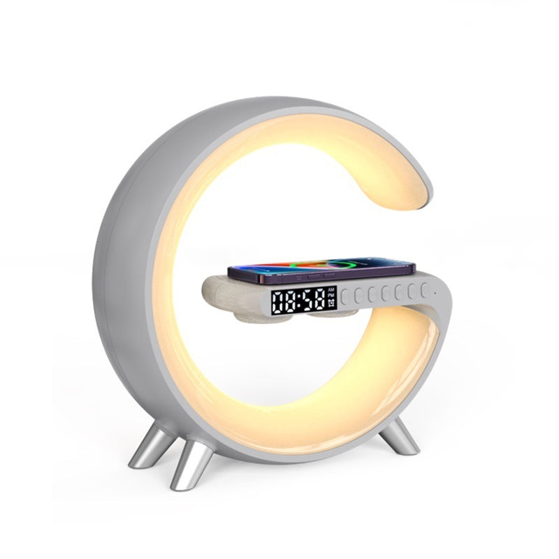 Intelligent G‑Shaped LED Lamp with Bluetooth Speaker, 15W Wireless Charger & App‑Controlled RGB Atmosphere Light for Bedroom Decor